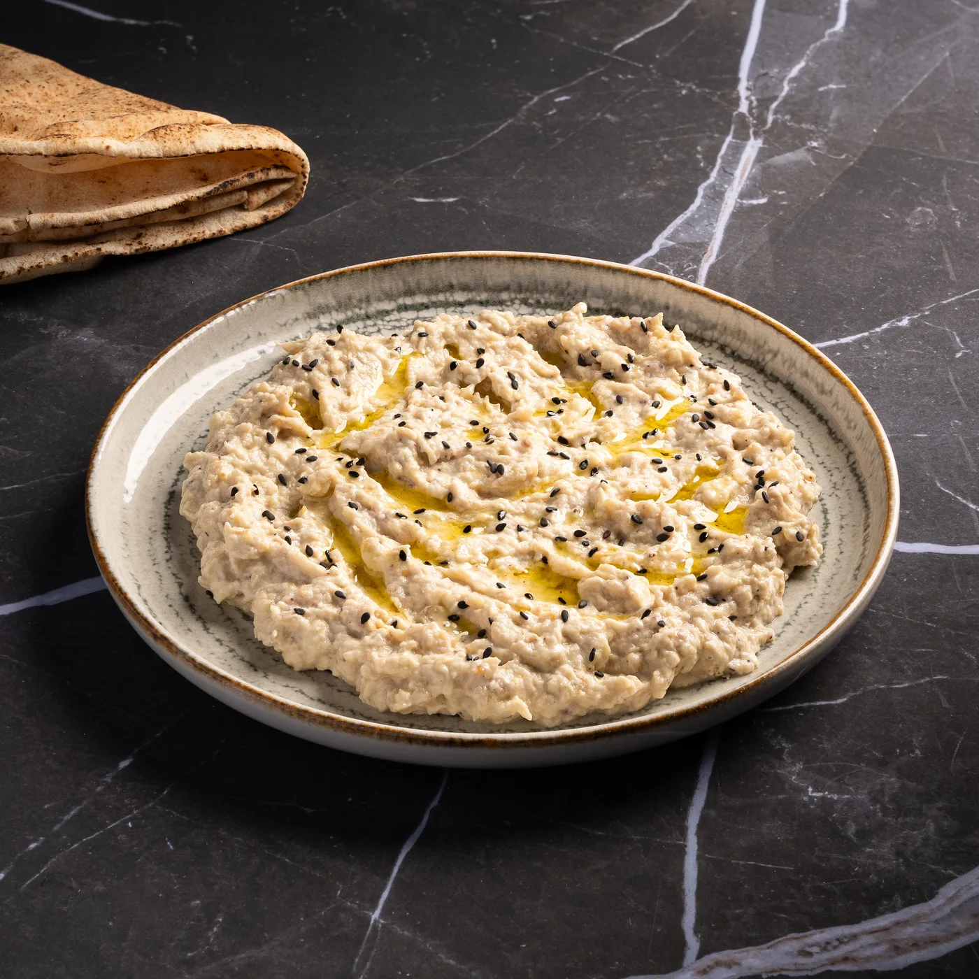 Moutabal, caviar d'aubergines fumées au tahini et sumac